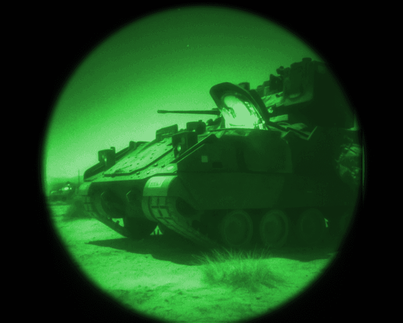 ATN PVS-14 mounted behind a weapon optic