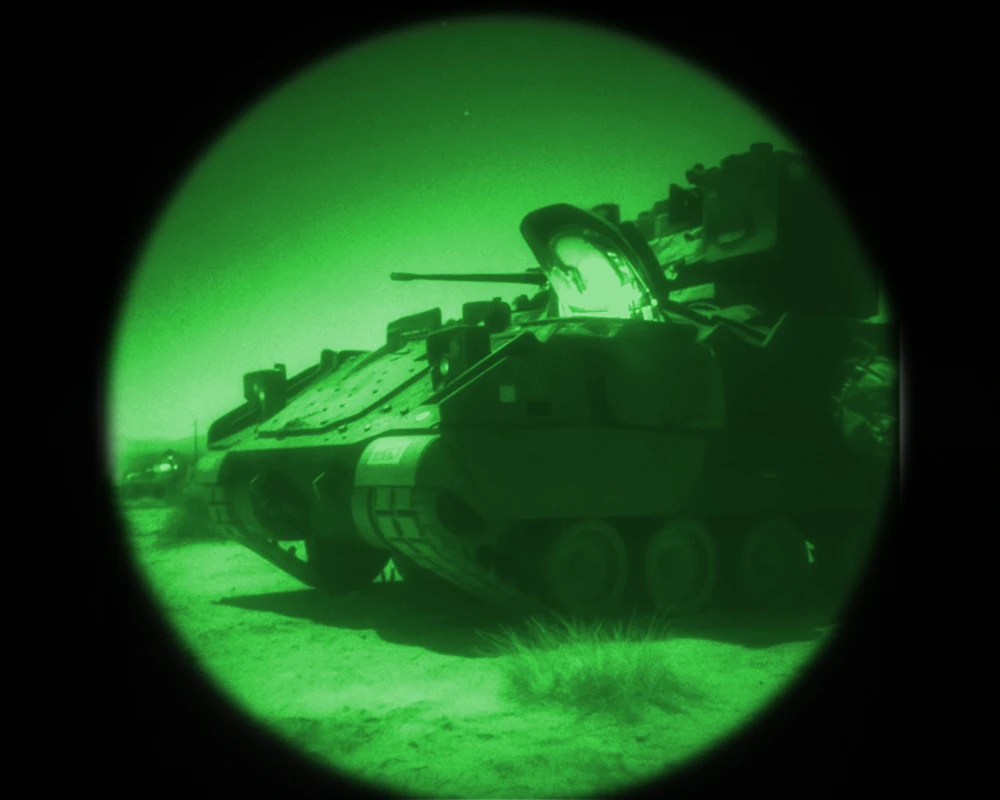 ATN PVS-14 mounted behind a weapon optic